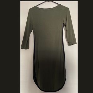 This Basic, but rare dress is perfect with some thigh black boots!